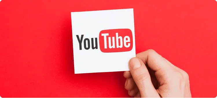  Ilustración del logo de YouTube en referencia a cómo subir y publicar videos en YouTube